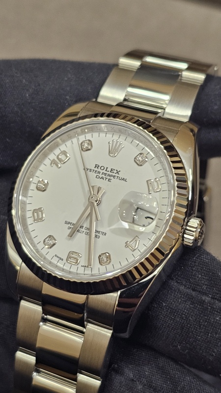 Rolex Oyster Perpetual Date 115234-0010